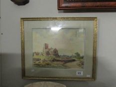 A framed and glazed watercolour church scene