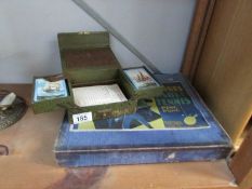 A cased bridge cards set and a boxed Jaques table tennis/ping pong