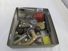 A mixed lot including pen knives, buttons,