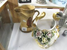 A Royal Doulton jug (chip to spout) and an Italian floral ornament.