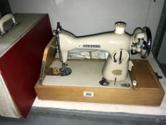 A New Home sewing machine.