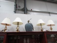 2 pairs of table lamps and one other.