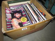A quantity of 'Skin Deep' Tattoo magazines and other Tattoo books.