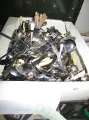 A large box of cutlery.