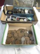 2 trays of assorted coins.