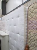 A double divan bed with mattress,.