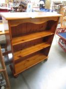 A pine book case.