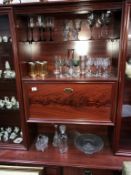 3 shelves of glass ware,