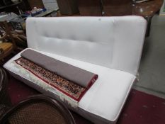 A retro style sofa bed.