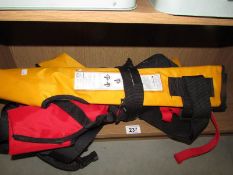 3 unused life jackets.