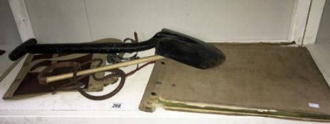 A mixed lot consisting of military map case, copy case, military shovel and pair of stirrups.