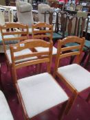 A set of 4 dining chairs,