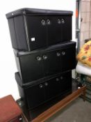 3 faux leather storage boxes.