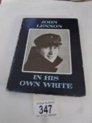 A copy of John Lennon 'In His Own Write'.