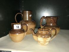 3 Doulton stoneware jugs and a teapot, a/f.