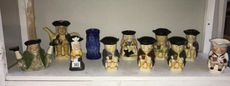 A collection of 10 Toby jugs by Tony Wood and a Toby teapot by H J Wood's.