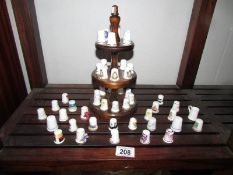 A mixed lot of collector's thimbles including signs of the zodiac and others.