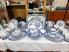 A large quantity of blue and white china and a Royal Doulton jug.