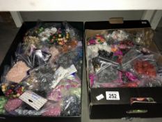 2 boxes of craft accessories including bow and beads, all bagged.