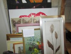 A quantity of framed and unframed prints.