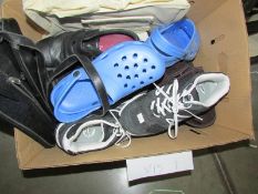 A box of shoes including trainers, crocs etc.