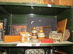 A shelf of miscellaneous including cottage teapot, art pottery etc.