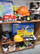 3 shelves of vintage toys.