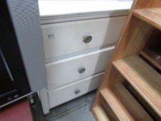 A painted 3 drawer chest.