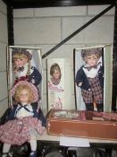 5 porcelain dolls.