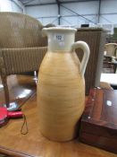 A large pottery jug.