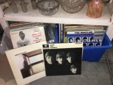 2 boxes of LP records including With the Beatles. Dire Straights etc.