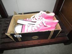 A new boxed pair of ladies pink Lonsdale canvas shoes, size 5.