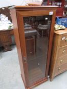 A mahogany effect cabinet,.