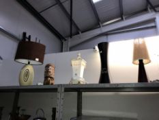 3 table lamps and 2 wooden items.