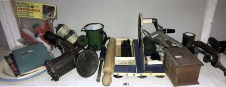 A mixed lot of kitchenalia including mincer, marmalade cutter, enamel ware etc.