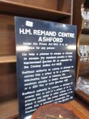 A sign from H.M remand centre Ashford.