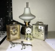 3 clocks, a lamp etc.