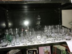 A shelf of glassware,