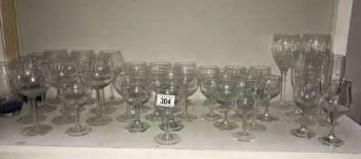 A shelf of drinking glasses.