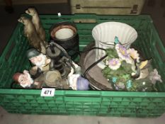 A box of miscellaneous garden items.