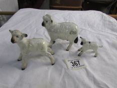 A Beswick sheep and 2 Beswick lambs.