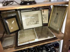 A shelf of framed and glazed maps, pictures, picture frames etc.