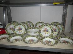 A large fruit bowl and 18 small bowls.