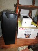 A Kodak photo printer and a shredder.