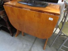 A drop leaf table,