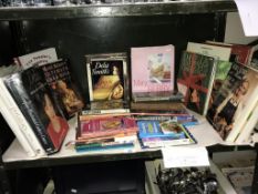 A shelf of cookery books.