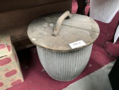 An old dolly tub with lid