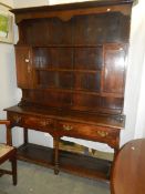 A period oak dresser.