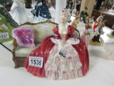 A Royal Doulton figurine 'Belle of the Ball'.