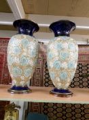 A pair of Royal Doulton stoneware vases.